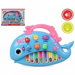 juguete musical con forma de ballena y teclado